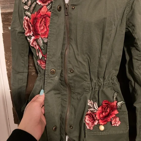 Army green, cinched waist jacket, with crocheted flower patches. - Picture 3 of 5